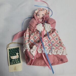 1990 Just Ducky Porcelain Pig Doll with Pink & Blue Clothing Holding a Heart NEW
